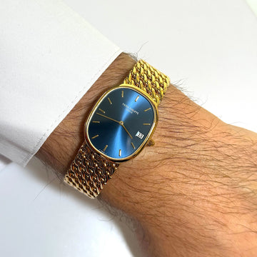 Patek Philippe Golden Ellipse Date 18K Gold Blue Dial Quartz Woven Gold Bracelet