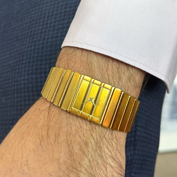 Piaget Polo Men's 25mm Gold Dial Patina 18K Yellow Gold Quartz Movement 7131C701